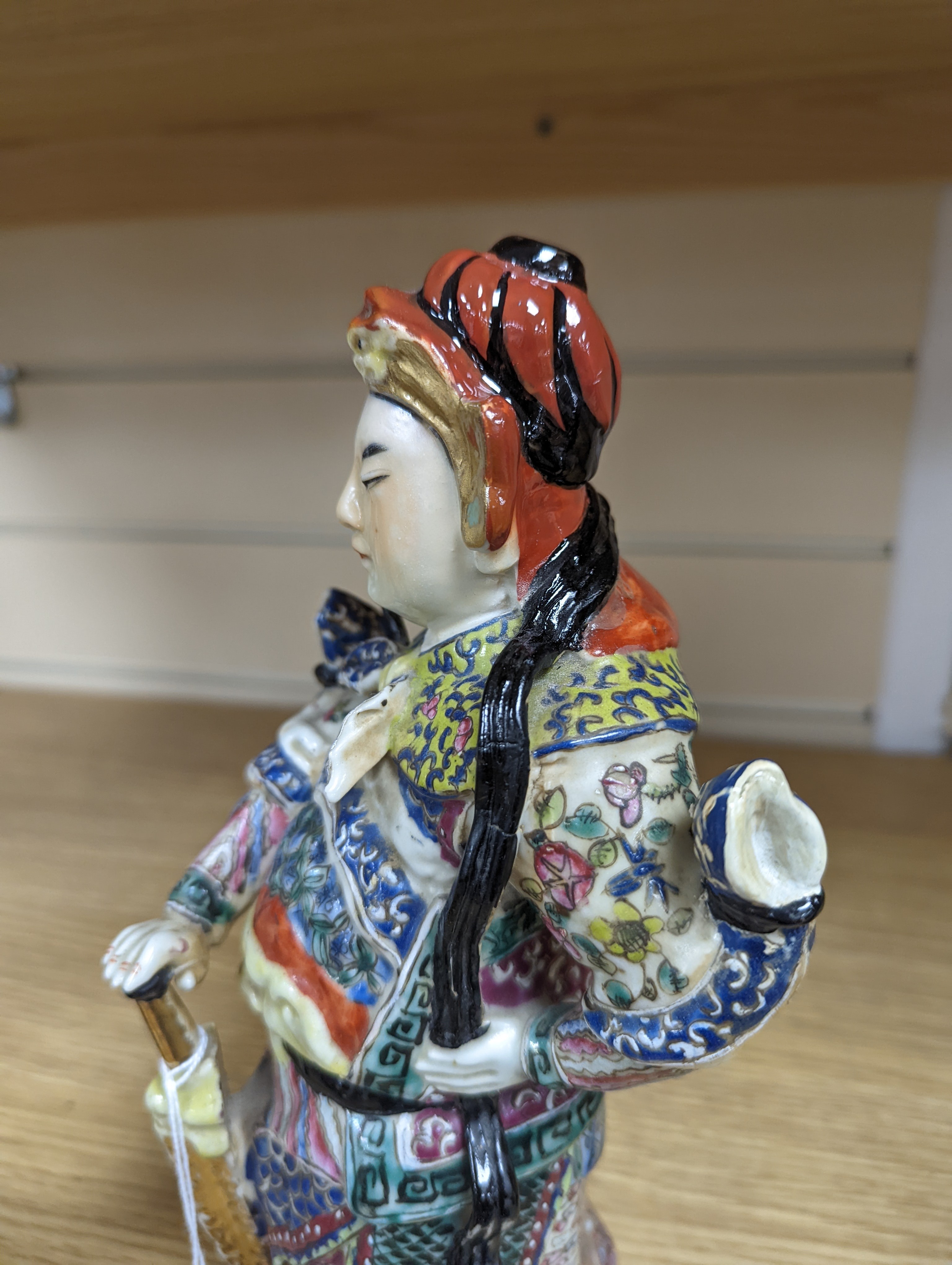 A Chinese enamelled porcelain figure of a General, Republic period, 26cm